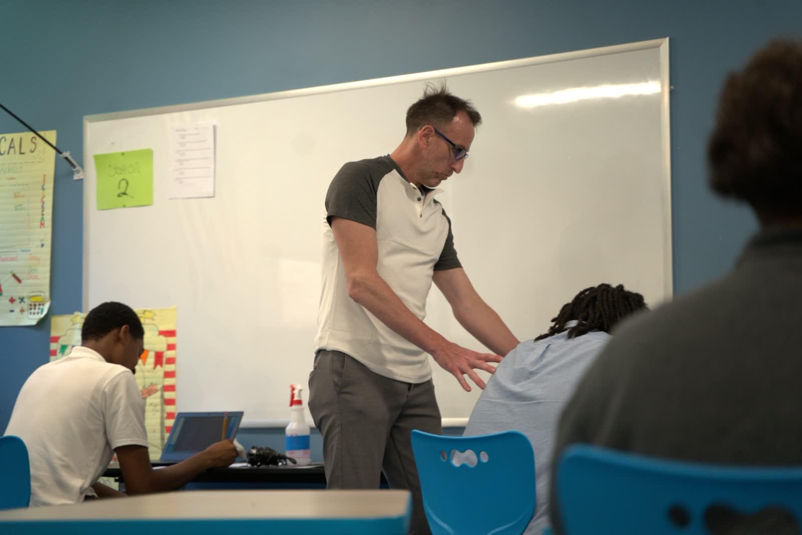 A one-to-one coaching conversation in class