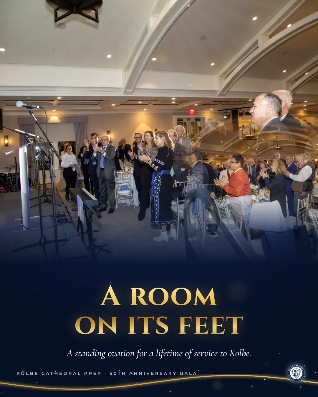 Guests rising to their feet and applauding. A room on its feet: a standing ovation for a lifetime of service to Kolbe.